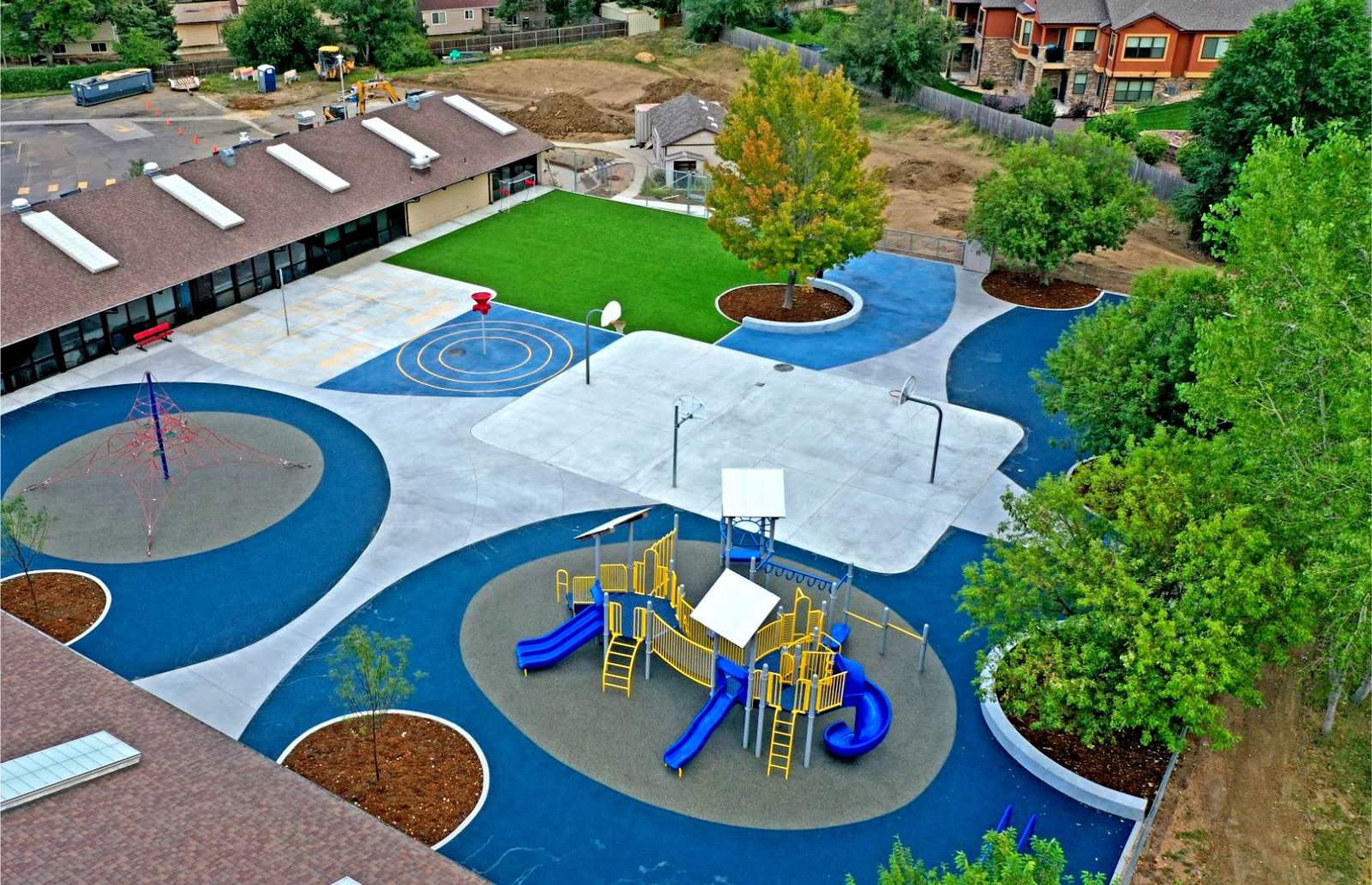 Aerial view of the Woodrow Wilson Academy playground, basketball court, and new concrete walks